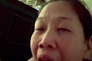 Korean milf sucks husband's big cock in pov