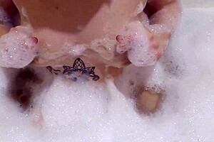 Lovely MILF sensually sucks big rubber dick solo