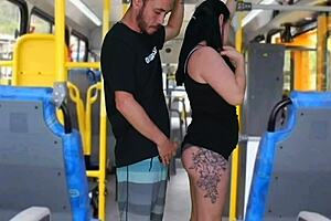 Hey dude, check this brunette groping on the bus!