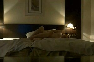 Watch this couple enjoying their time in the hotel?