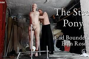 Steel pony device brings blindfolded orgasms and domination