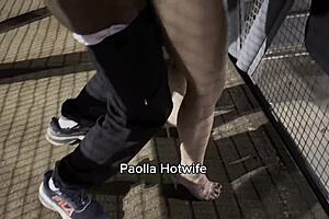 married woman on the catwalk entertaining drivers on br 153.