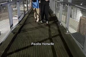 married woman on the catwalk entertaining drivers on br 153.