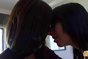 experienced milf gently introduces cute brunette to passionate lesbian encounters with licking and kissing.