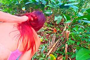 Risky handjob for cute brunette on beach trail