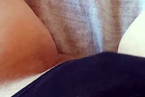 Gretala relaxes in her black slip, feeling sensual