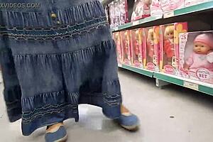 Mature woman flashes hairy pussy in public shop