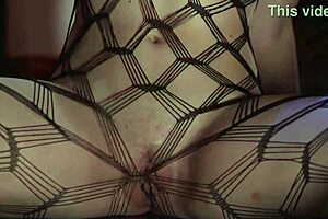 Samantha Rone in fishnets teases her wet pussy intensely