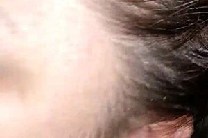 Oh man, that white milf is really going to town sucking on that skinny cock!