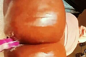 She stretches her asshole with a monster cock outdoors.