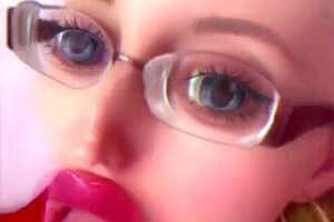 Dollification sissification ramps up with huge pink lips transformation in this bimbo fetish crossdressing session with glasses and lipstick