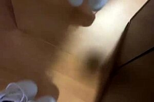 She wakes up early, slipping off her smelly socks to reveal bare feet for fetish fans.