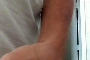 A guy strokes his cock until he cums.