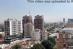 tanned latina model with old tourist on balcony