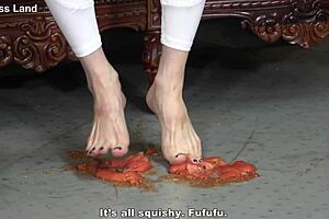 Japanese Mistress Crushes Food And Demands Feet Licking