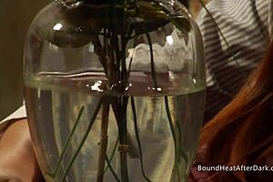 bound lady contrasts with dominant lesbian in bdsm scene