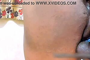 Oh, she's so horny for cock, bent over and playing with her ass!