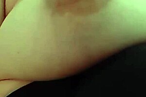 Mature woman wants her big natural tits nipple sucked in homemade setting.