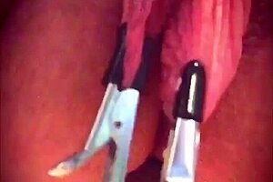 Big pink pussy lips dangled and stretched down with weights