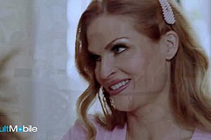 Stunning milf receives help with her dress from stepson and flashes her chest.