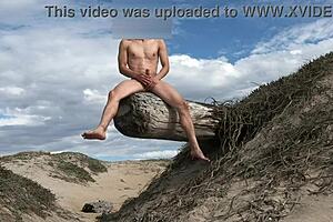 Nude posing and COCK TEASING at public beach, CUMMING in the plaza.