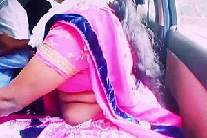 In the car, a cute Indian housewife cheats with her boyfriend through dirty talk and intense fucking