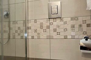 A guy jerks off intensely on the toilet with huge cock