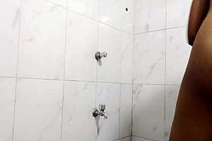 desi indian teen flashes her amazing pussy and tits indoors in this video