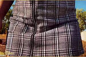 Milf wife flashes shaved pussy in upskirt voyeur scene.