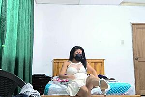 the busty executive picks a white dress and starts sensual moves showing her beautiful vagina