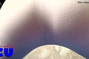 she shows off in see-through clothes with butt plug.