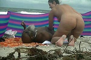 Caribbean nude beach cuckold voyeur action, watch her flash that pussy!