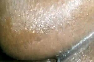 Calmly taking black cock deep into ass