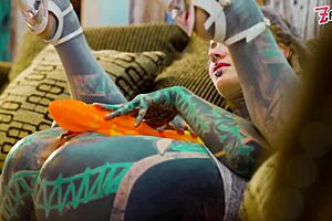 Solo play with XL dildo in fishnets and heels.