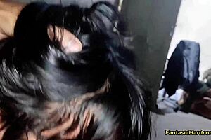 Watching TikTok video with Argentinian friend, admiring her attractive figure in casual setting