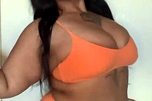 horny milf in bikini teases with seductive dance flaunting big ass and tits