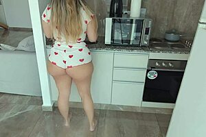 watch my big ass stepsister teasing me in the kitchen until we fuck