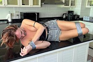 bound and teased on countertop of desire