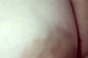 intriguing close-up of nipple on piano keys in detailed view