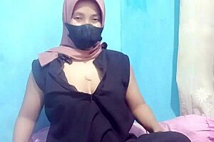 indonesian hijab girl performs colmek masturbation with dildo reaching orgasm