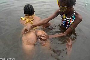 when these two lesbians from the tribe bathe together in the village river