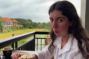 Eating Pizza With Sauce On Face In Public Cafe