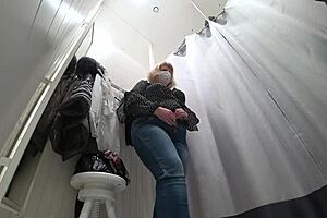 hidden camera catches fat milf in fitting room