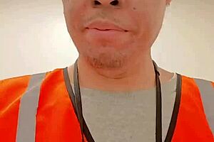 Asian Amateur Walking Outdoors During Work