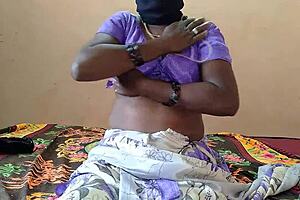 Girl Inserts Vibrator in Pussy on Bed