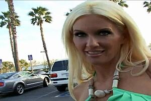 Girl gives ice cream man a peek under her skirt while sitting in the back