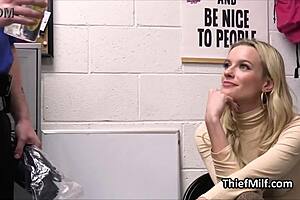 Blonde milf housewife kneels at work