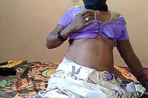 Girl Inserts Vibrator in Pussy on Bed