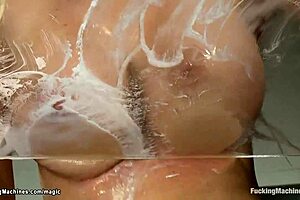 juicy big tits blonde interacts with machine