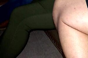 Intense passion builds as sexy wife engages in foreplay on the couch, her big tits heaving with desire